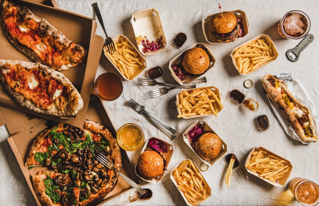 Delivery service for home party with burgers pizza and beer